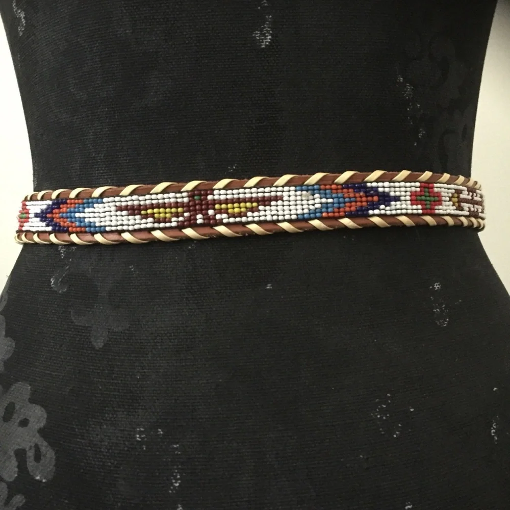 Vintage beaded belt size 26. Firebird design.